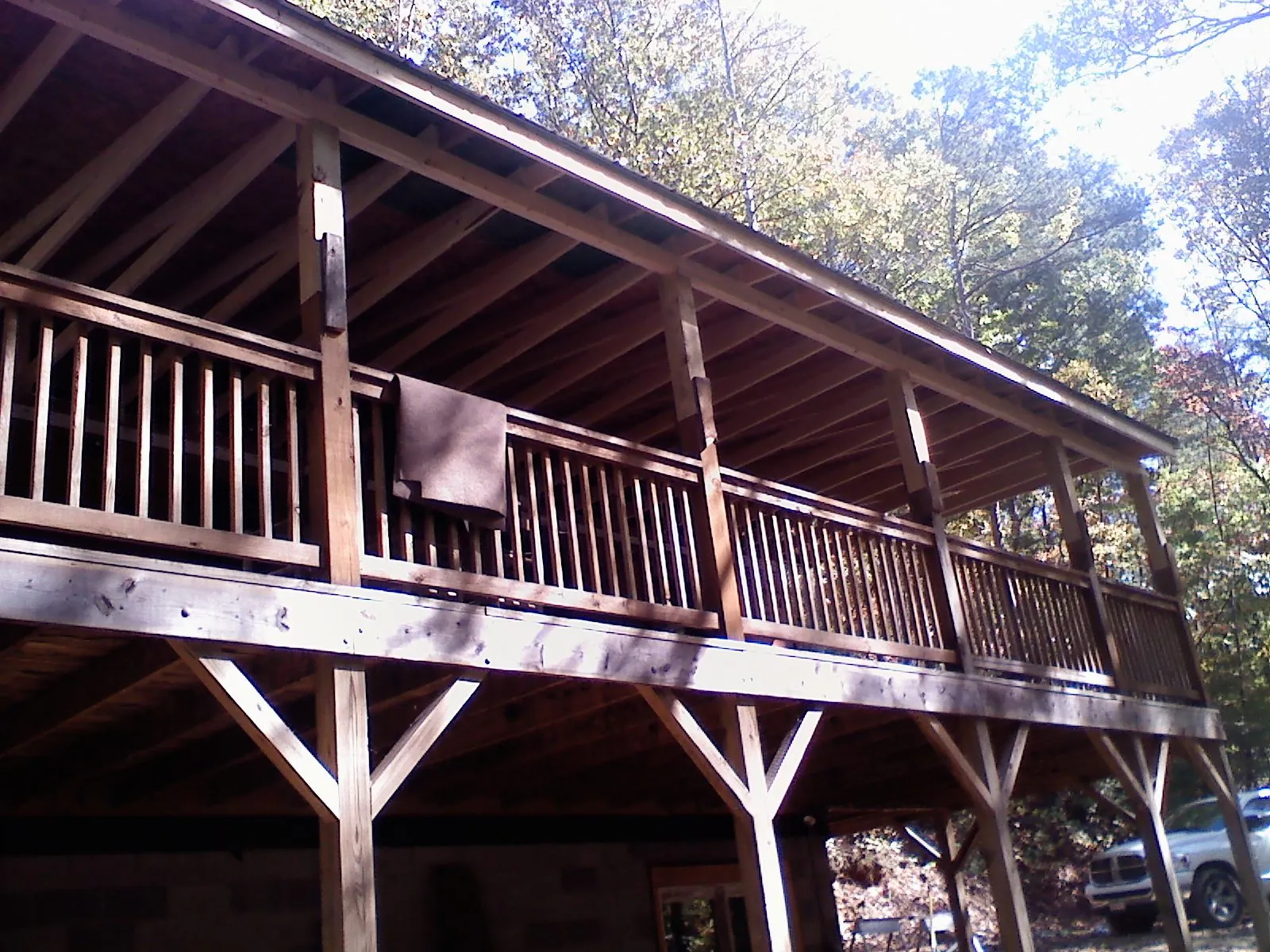 Timber framing under a new elevated porch and deck — Roof Leak Repair in Pauma Valley by Roofing Brothers